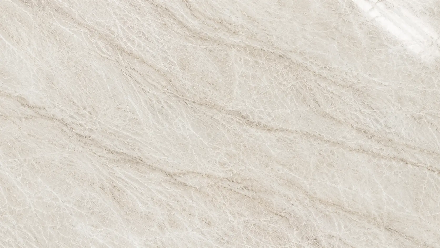 Taj Mahal Quartzite slab close-up with warm beige veining